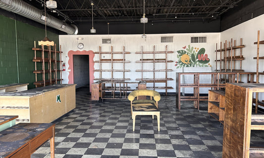 "Here we go again." We’re rebuilding the bookstore after a fire next door.