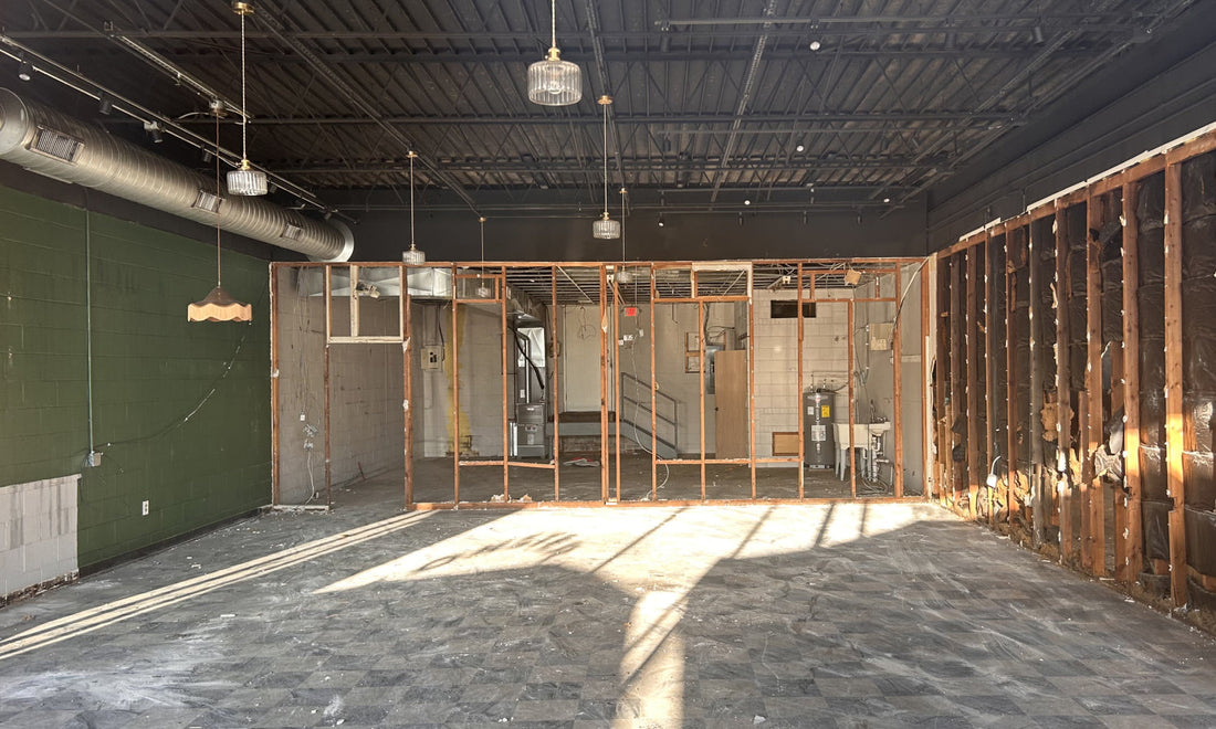 "Here we go again." We’re rebuilding the bookstore after a fire next door.