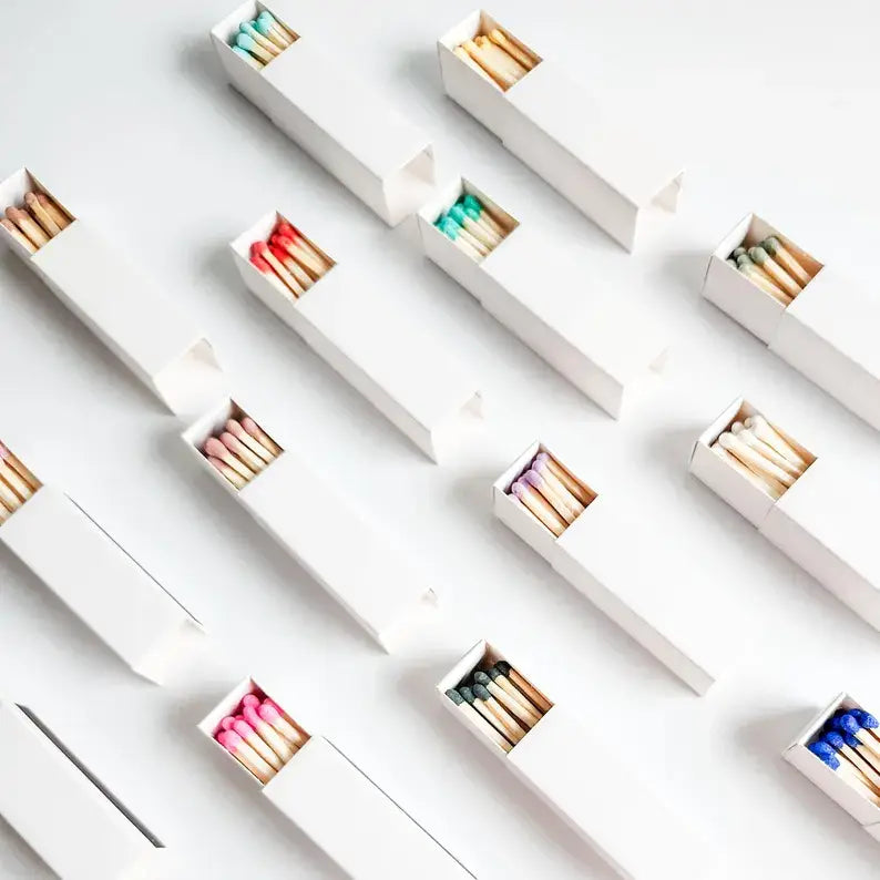 White Matchbox with Colorful Matchsticks