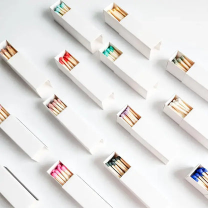 White Matchbox with Colorful Matchsticks