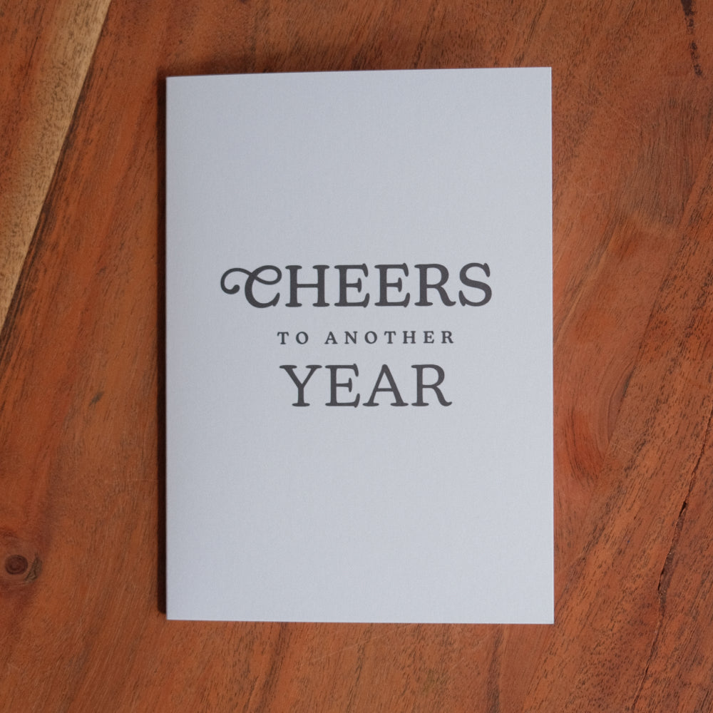 Cheers to another Year Greeting Card