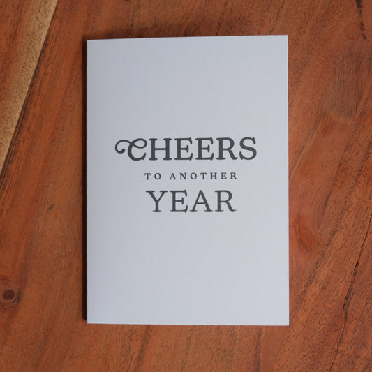 Cheers to another Year Greeting Card